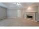 Relaxing living room area with a fireplace and great natural light at 4570 Thicket Trl, Snellville, GA 30039