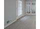 A living room offering outdoor access, natural light and neutral carpet at 4570 Thicket Trl, Snellville, GA 30039
