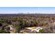 Distant view of a city skyline in the background, as seen from a wooded area on a clear day at 2 Westchester Sq, Decatur, GA 30030