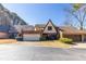 Charming single-Gathering home featuring a two-car garage and well-manicured landscaping on a sunny day at 2 Westchester Sq, Decatur, GA 30030