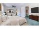 Spacious bedroom with a ceiling fan, accent chairs, and ensuite bathroom at 2 Westchester Sq, Decatur, GA 30030