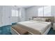 Bright, cozy main bedroom with plush bedding, and ample natural light from the windows at 2 Westchester Sq, Decatur, GA 30030