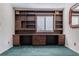 Bright office space featuring built-in shelving, cabinets, and a window with lots of natural light at 2 Westchester Sq, Decatur, GA 30030