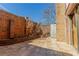 Tiled patio surrounded by a brick wall and fence at 2 Westchester Sq, Decatur, GA 30030