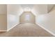 Bonus room with carpeted flooring and a vaulted ceiling at 717 Southland Pass, Stone Mountain, GA 30087