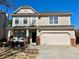 Charming two-story home with a welcoming front porch and well-maintained lawn at 1399 Dukes Creek Nw Dr, Kennesaw, GA 30152