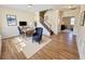 Bright office space features a large desk, comfortable chair, and stairs leading to upper level at 1399 Dukes Creek Nw Dr, Kennesaw, GA 30152