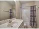 Cozy bathroom with shower and white vanity at 2357 Barrett Cottage Pl, Marietta, GA 30066