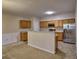 Kitchen featuring stainless steel appliances, granite countertops, and ample cabinet space for storage at 2357 Barrett Cottage Pl, Marietta, GA 30066