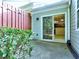 View of the outdoor patio, fenced yard, sliding glass door and a glimpse of the kitchen at 2357 Barrett Cottage Pl, Marietta, GA 30066