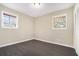Bedroom with one window and a built-in closet at 304 Mercer Dr, Jonesboro, GA 30236