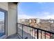 Balcony with a wrought iron railing offering neighborhood and skyline views at 898 Oak Sw St # 1306, Atlanta, GA 30310