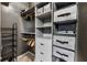 Organized closet with custom shelving, drawers, and hanging racks for optimal storage at 898 Oak Sw St # 1306, Atlanta, GA 30310