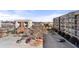 Apartment complex featuring a parking lot and trees at 898 Oak Sw St # 1306, Atlanta, GA 30310