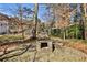 Backyard featuring a built-in fireplace and bench at 1352 Emory Ne Rd, Atlanta, GA 30306