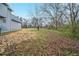 Large backyard with ample green space, offering privacy and potential for landscaping or recreational activities at 6112 Shadow Rock Ln, Lithonia, GA 30058