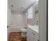 Well-lit bathroom features vanity, tub/shower combo and modern fixtures at 6112 Shadow Rock Ln, Lithonia, GA 30058