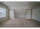 A room with carpet, grey paint and white trim at 6112 Shadow Rock Ln, Lithonia, GA 30058