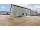 An expansive backyard with a patio and a large green lawn at 1160 Faulkner Way, Jonesboro, GA 30238
