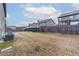 Large backyard features a wooden privacy fence, a lush lawn, and mature trees at 1160 Faulkner Way, Jonesboro, GA 30238