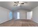 Bedroom featuring neutral walls, carpet flooring, ceiling fan and an ensuite bath at 1160 Faulkner Way, Jonesboro, GA 30238