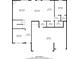 Detailed floorplan showcasing the layout with kitchen, bedrooms, living spaces, and garage dimensions at 1160 Faulkner Way, Jonesboro, GA 30238