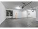 Spacious garage with water heaters and sealed concrete flooring at 1160 Faulkner Way, Jonesboro, GA 30238
