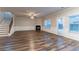 Spacious living room with a fireplace, and wood floors at 1160 Faulkner Way, Jonesboro, GA 30238