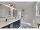 Modern bathroom with a dual sink vanity and a frameless glass shower at 2954 Lighthouse Ct, Acworth, GA 30101