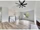 Spacious living area featuring hardwood floors, recessed lighting, and a modern fireplace at 2954 Lighthouse Ct, Acworth, GA 30101