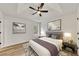 Comfortable bedroom with a ceiling fan, plush bedding, and tasteful decor at 2954 Lighthouse Ct, Acworth, GA 30101