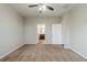 Spacious bedroom with neutral carpet, adjacent bathroom, and natural light at 450 Lake Ridge Ln, Fairburn, GA 30213