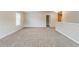 Large open loft space with neutral carpet and natural light at 450 Lake Ridge Ln, Fairburn, GA 30213