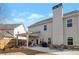 Spacious backyard featuring a covered patio with grill and a view of the home at 531 Eagles Nest Cir, Auburn, GA 30011