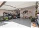Spacious garage with epoxy flooring and overhead storage at 531 Eagles Nest Cir, Auburn, GA 30011