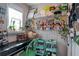 Bright workspace with window, shelving with decorations, and desk at 531 Eagles Nest Cir, Auburn, GA 30011