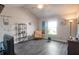 Cozy living room with vaulted ceilings, wood-look floors, and decor at 531 Eagles Nest Cir, Auburn, GA 30011
