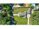 Bird's eye view of the property highlighting the meticulously maintained lawn and architectural roof lines at 783 Blackberry Trl, Lawrenceville, GA 30043