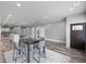 Spacious basement with a dining area, hardwood floors, and an open layout at 783 Blackberry Trl, Lawrenceville, GA 30043