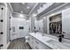 A bright bathroom features a walk-in closet, double vanity, and luxurious glass enclosed shower at 783 Blackberry Trl, Lawrenceville, GA 30043