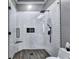 Modern bathroom featuring a glass shower with a rainfall showerhead and white subway tile at 783 Blackberry Trl, Lawrenceville, GA 30043
