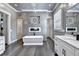 This bathroom is stunning with the soaking tub, fireplace, and double walk-in showers at 783 Blackberry Trl, Lawrenceville, GA 30043