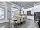 Elegant dining room features stylish furnishings, natural light, and a modern chandelier at 783 Blackberry Trl, Lawrenceville, GA 30043