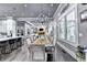 Open concept dining room with views into kitchen and living area at 783 Blackberry Trl, Lawrenceville, GA 30043