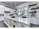 Bright and airy kitchen with a large island, modern fixtures, and ample counter space at 783 Blackberry Trl, Lawrenceville, GA 30043