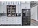 Modern kitchen with stainless steel appliances and white cabinets at 783 Blackberry Trl, Lawrenceville, GA 30043