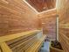 Beautiful home sauna room featuring cedar walls and benches and a modern design at 783 Blackberry Trl, Lawrenceville, GA 30043