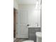 Bathroom featuring a gray vanity, mirror, modern lighting, and a toilet at 2008 Main Nw St, Atlanta, GA 30318
