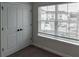 Window-lit bedroom featuring a storage closet offering additional space with an outside view at 2008 Main Nw St, Atlanta, GA 30318