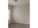 Cozy bedroom with a single window and neutral carpeting, providing a blank canvas for personalization at 2008 Main Nw St, Atlanta, GA 30318